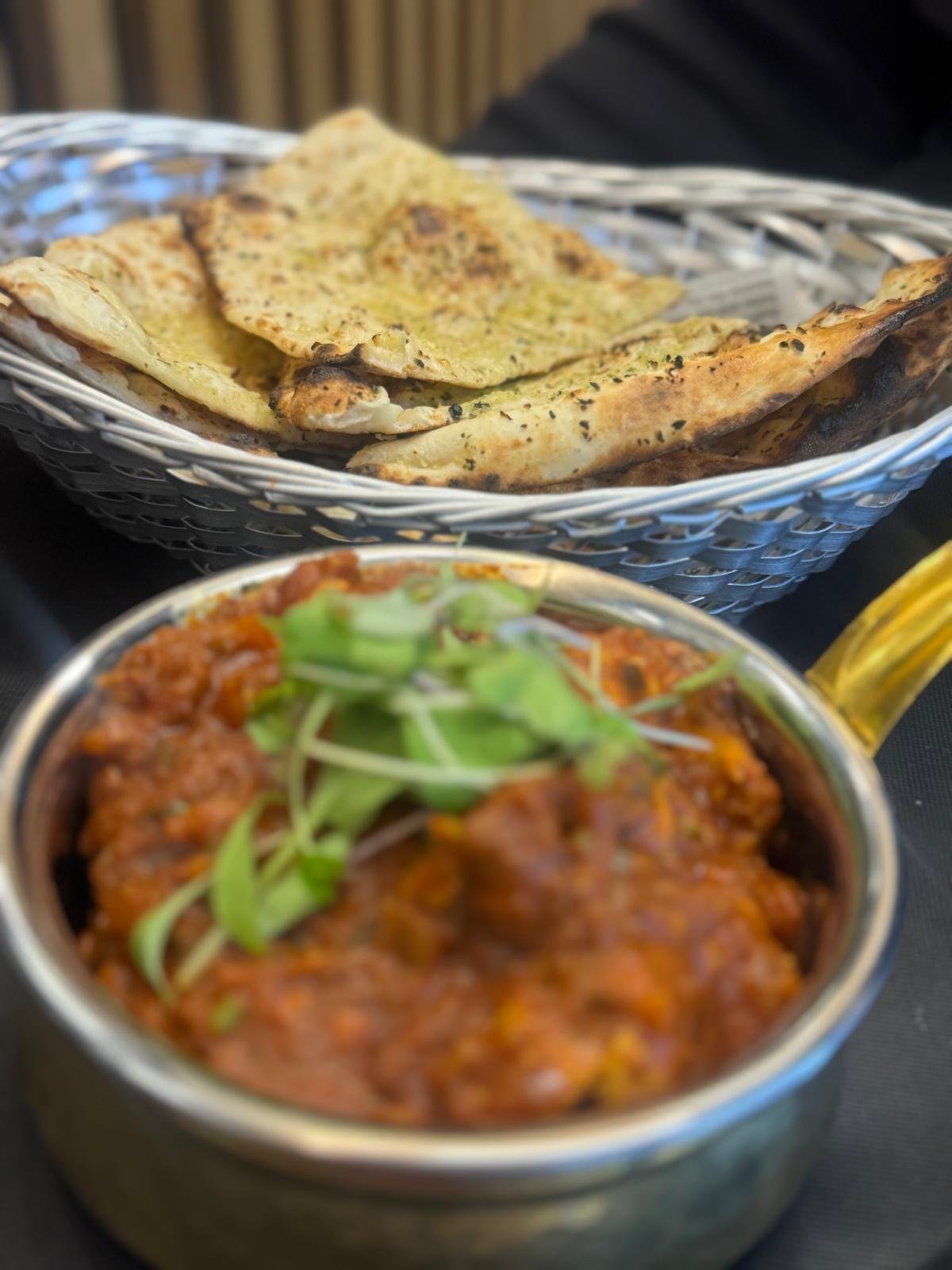 Curry with naan basket